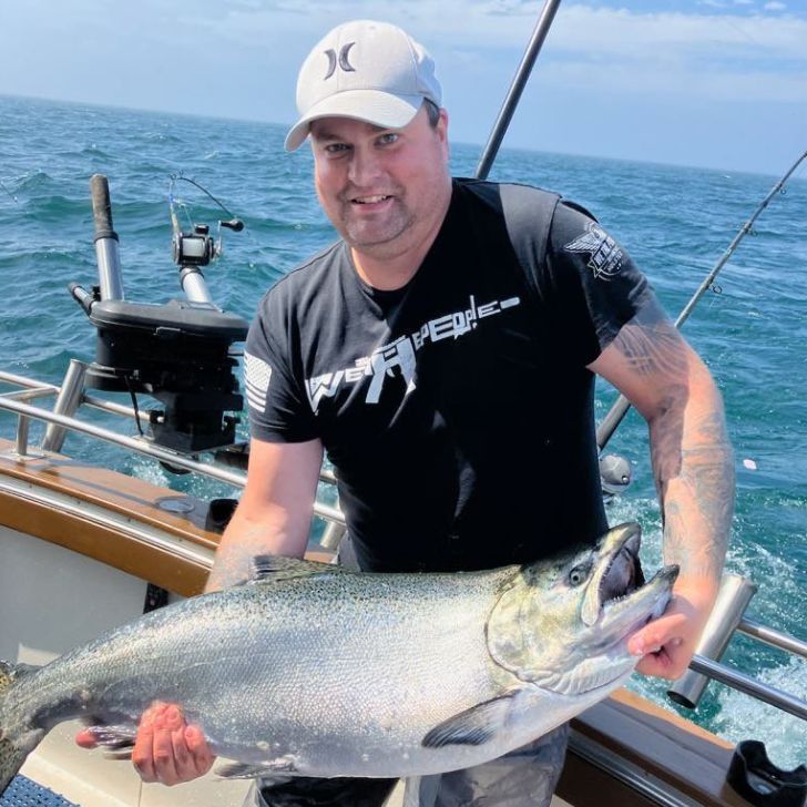 man holding a fish